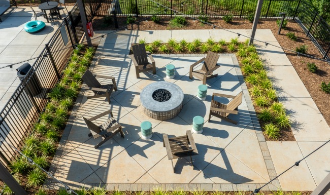 Fire Pit Aerial view of outdoor firepit at The Hominy apartments in Candler, NC.