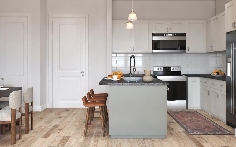 a kitchen with white cabinets